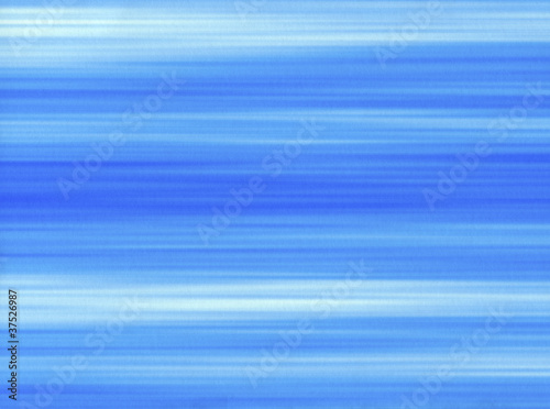 Blue paint brush strokes lines on a paper background.