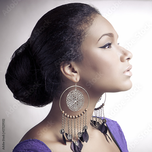 Close-up portrait of young beautiful african woman
