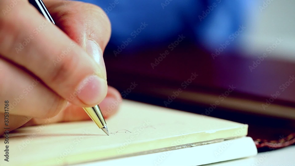 Man writing documents