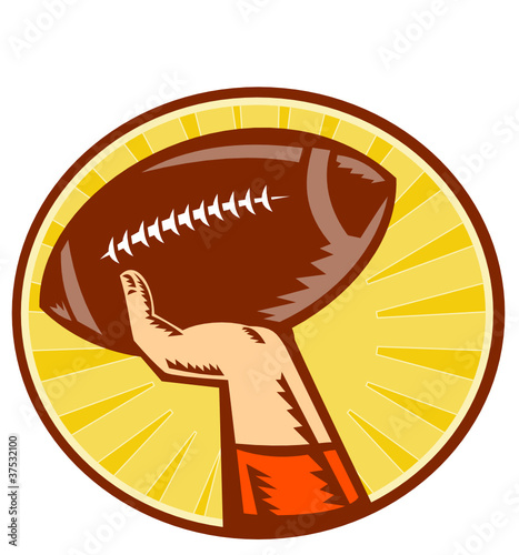 american football player hand throwing