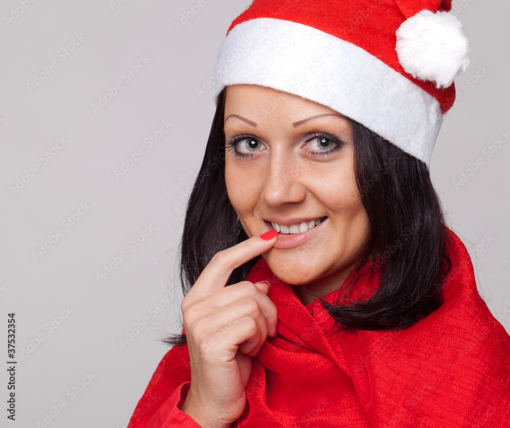A beautiful girl dressed as Santa Claus A beautiful girl dressed as Santa Claus