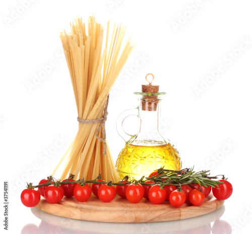 spaghetti, jar of oil, rosemary and tomatoes cherry