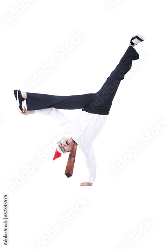 Businessman with christmas hat dancing