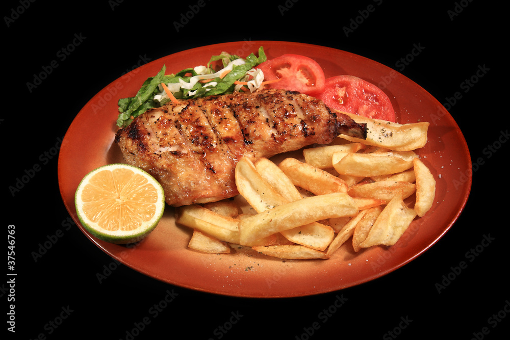 grilled chicken breast served on a plate