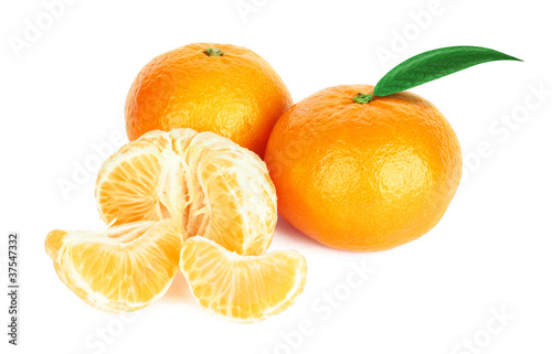 Fresh tangerine with leaves and segments