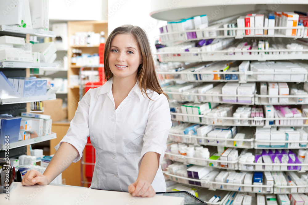 Female Pharmacist Standing at Counter