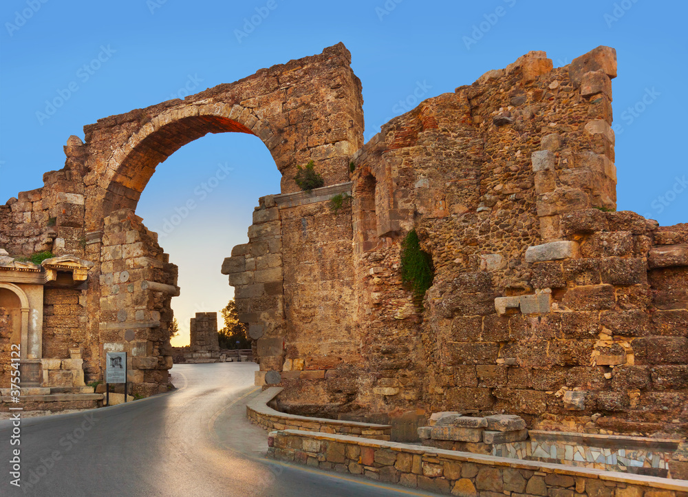 Road and ruins in Side, Turkey at sunset