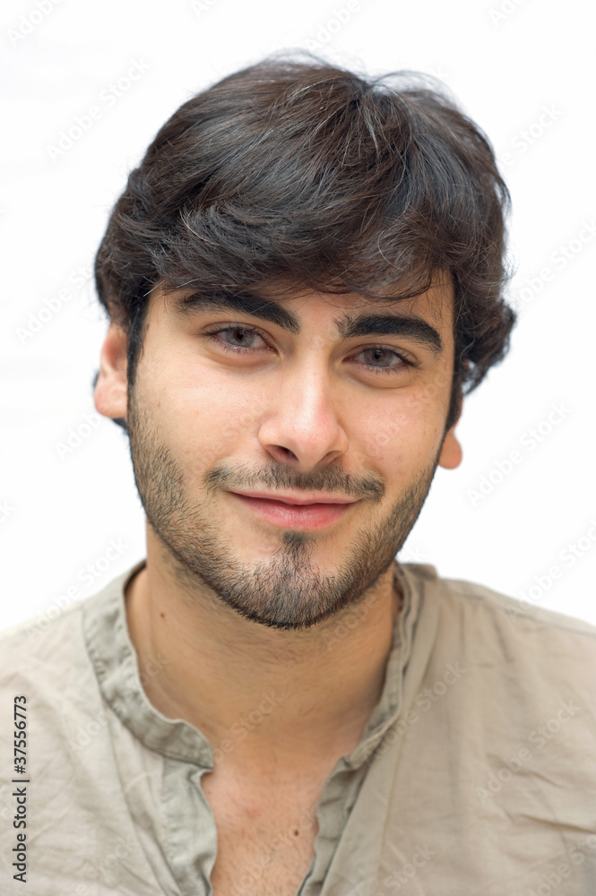 Fototapeta premium Happy casual man smiling over white background.