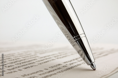 Ballpoint pen on contract photo