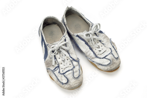 Old worn sports shoes