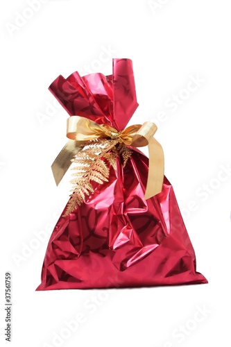 Red bag for a gift with gold ribbon Room for text