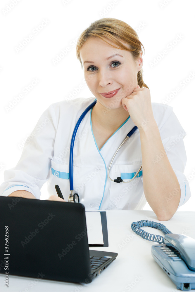 A woman doctor consultant with a laptop on a white background. A woman doctor consultant with a laptop on a white background.