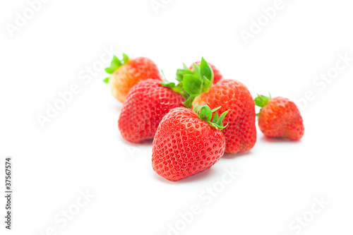 big juicy red ripe strawberries isolated on white