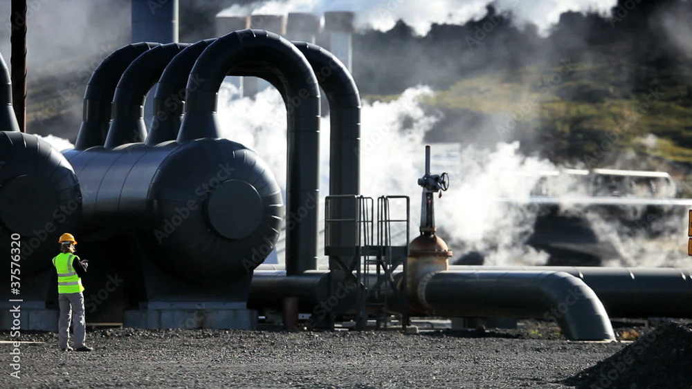 Female Engineer Working at Geothermal Power Station