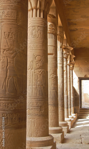 Colonnade with Egyptian carving in Philae temple, Egypt