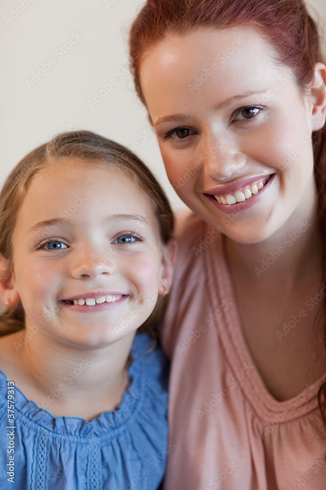 Smiling mother and daughter Smiling mother and daughter