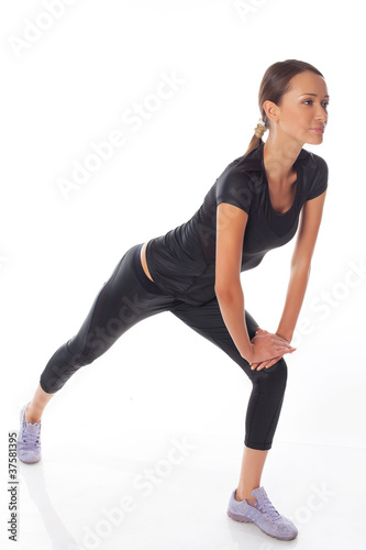 woman doing gymnastic on a white background
