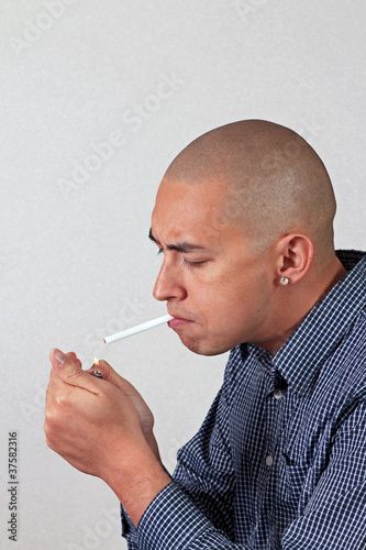 Man Lights a Cigarette