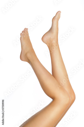 sexy healthy slender female legs isolated on white background - © Slaweek