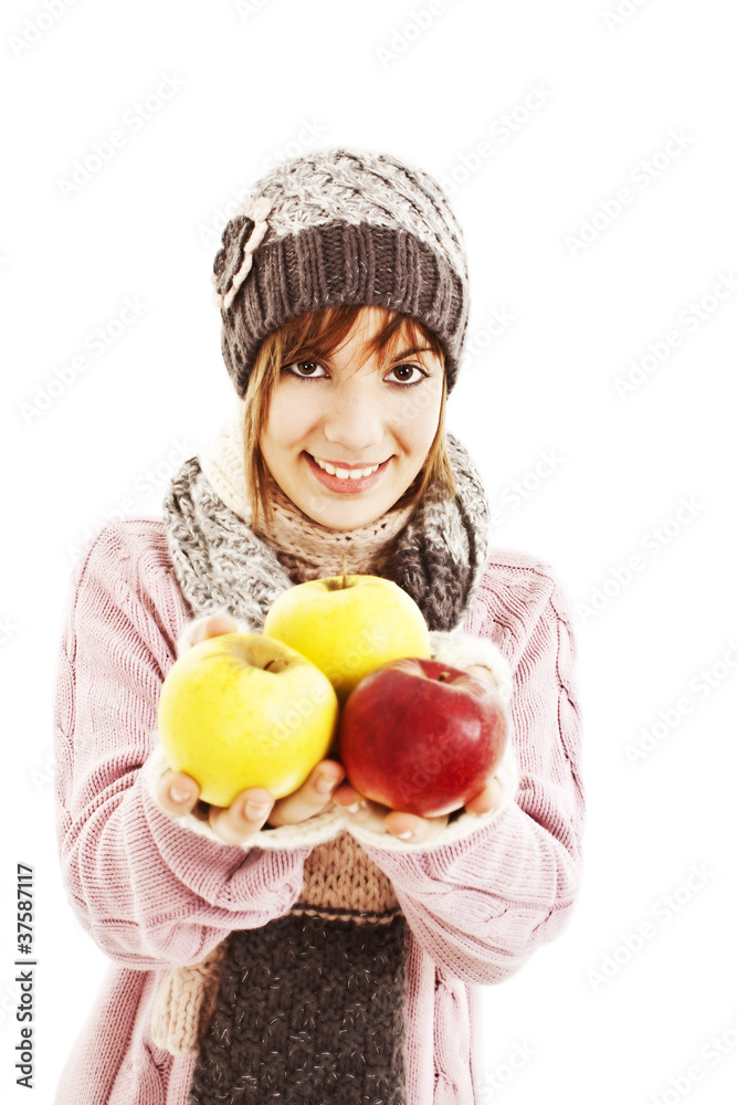 Beautiful young woman with apple. Winter style. Beautiful young woman with apple. Winter style.