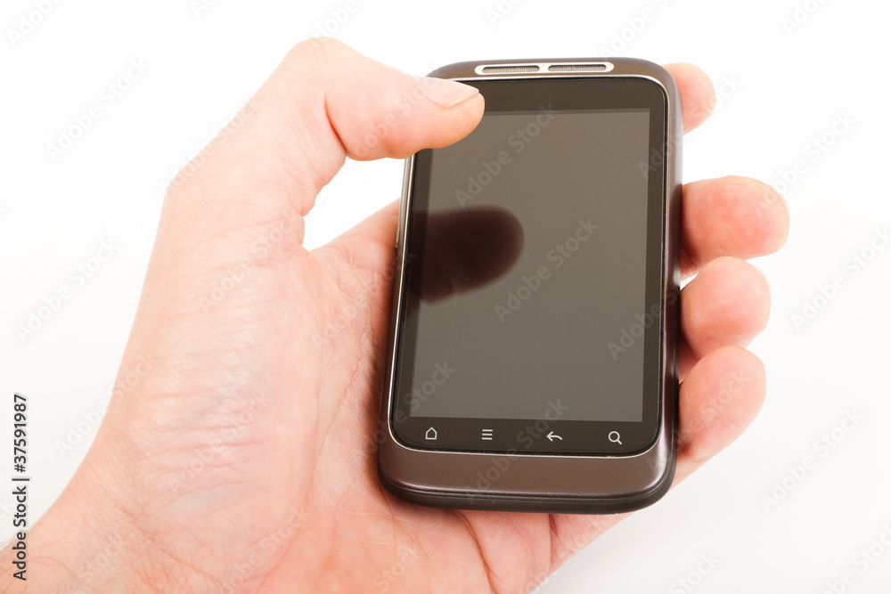 .Mobile phone in hand on white background. .Mobile phone in hand on white background.