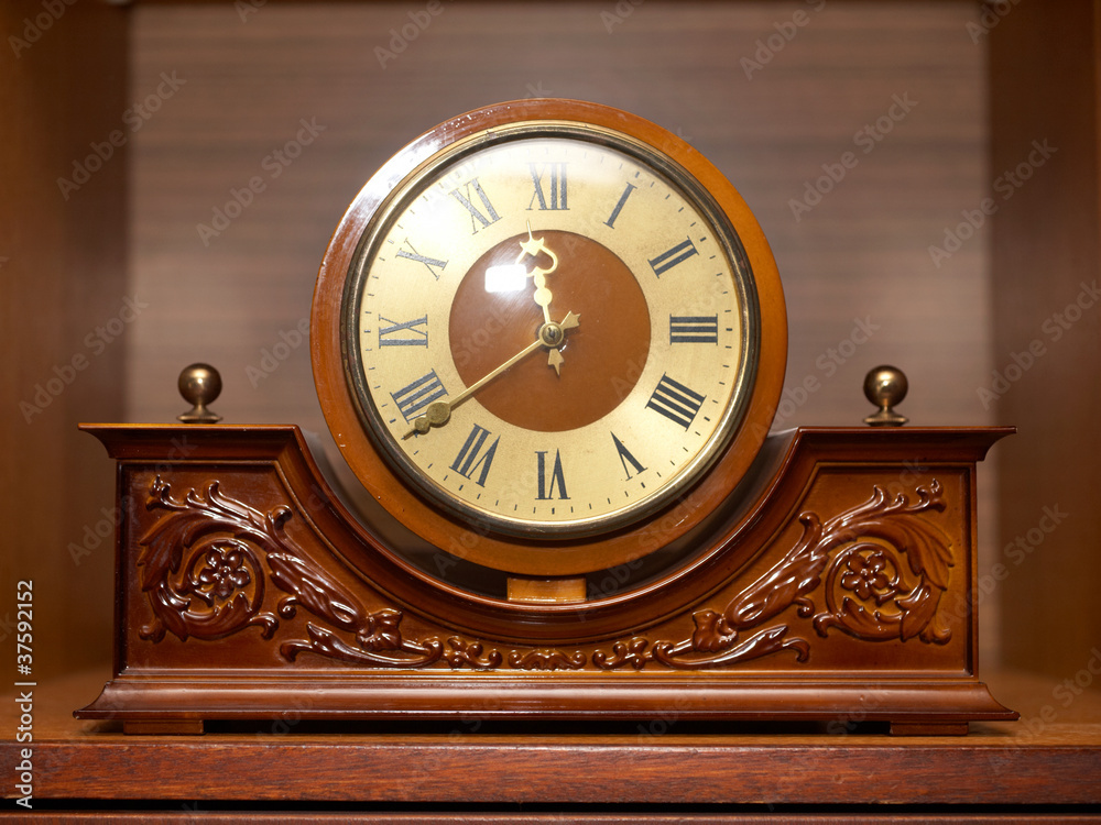 Watch on a shelf Watch on a shelf