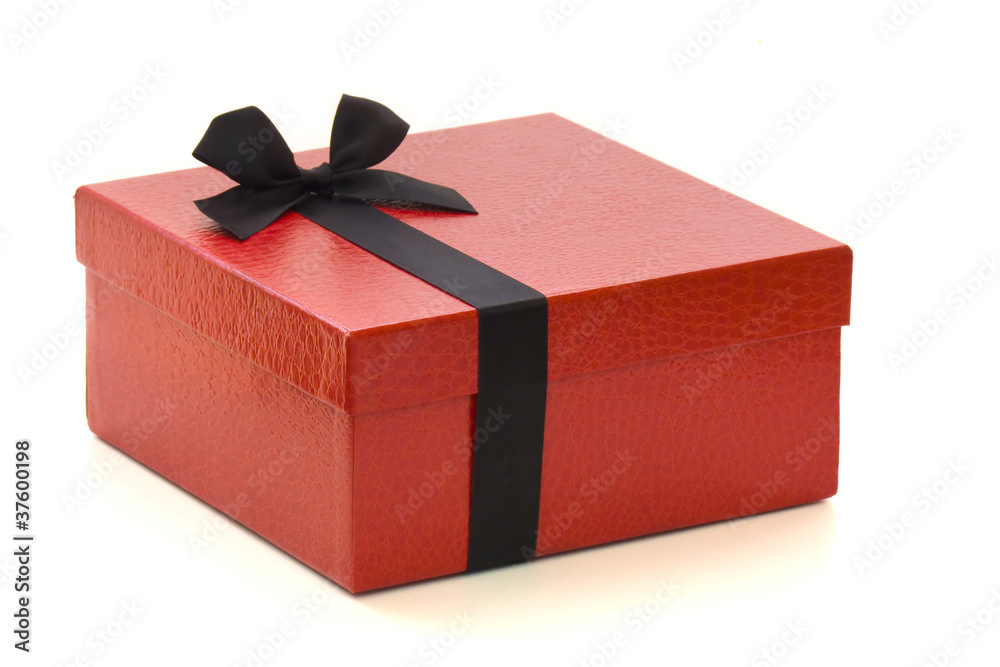 Miseria su Destello Caja de regalo roja con listón negro foto de Stock | Adobe Stock