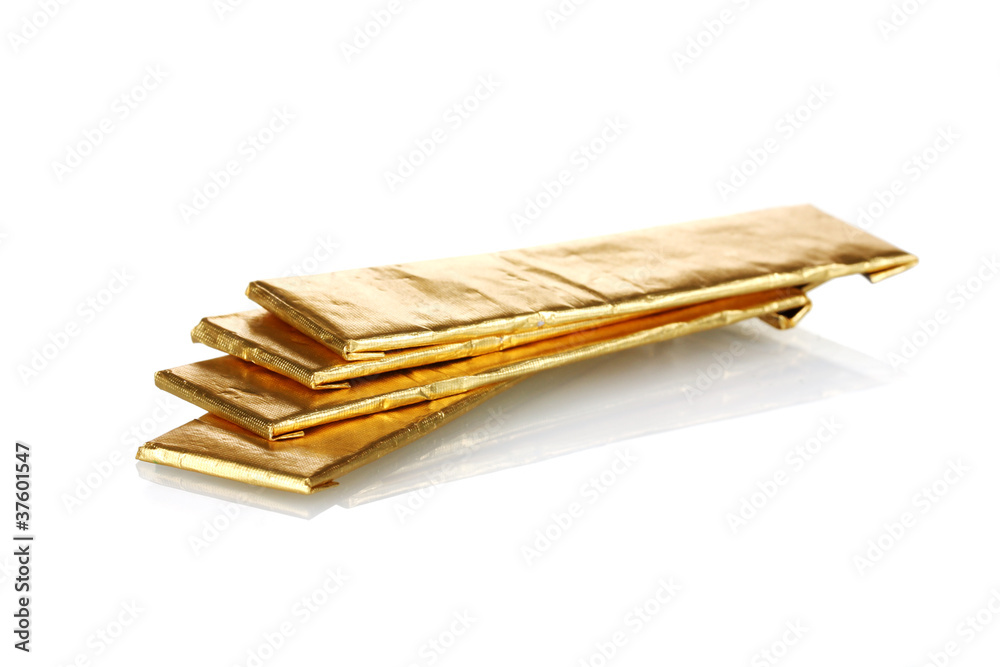 chewing gums wrapped in golden foil, isolated on white chewing gums wrapped in golden foil, isolated on white
