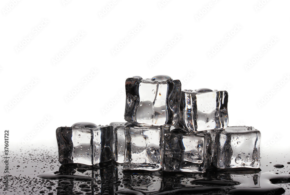 Melting ice cubes isolated on white Melting ice cubes isolated on white