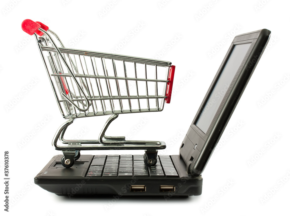 Shopping cart over a laptop