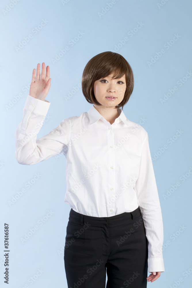 Beautiful business woman tocuhing on blue background Beautiful business woman tocuhing on blue background