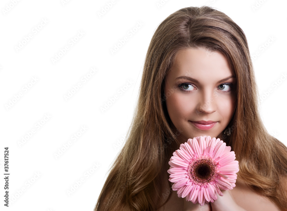 closeup portrait of a pretty young woman holding pink flower closeup portrait of a pretty young woman holding pink flower