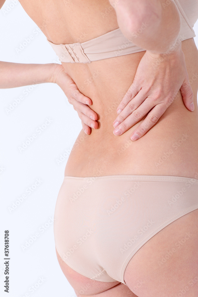 Closeup on woman's back hurting