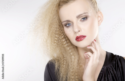 Young pretty woman with beautiful blond hairs