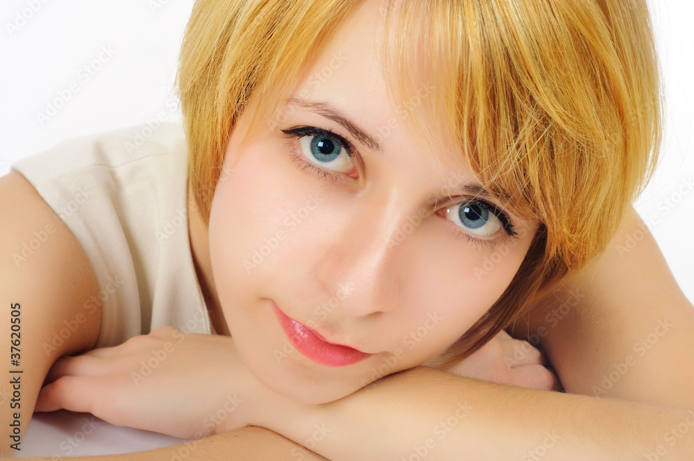close-up portrait of a smiling girl with blue eyes with white co close-up portrait of a smiling girl with blue eyes with white co