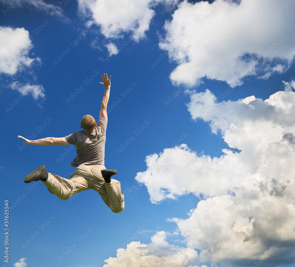Obraz premium Man jump to sky.