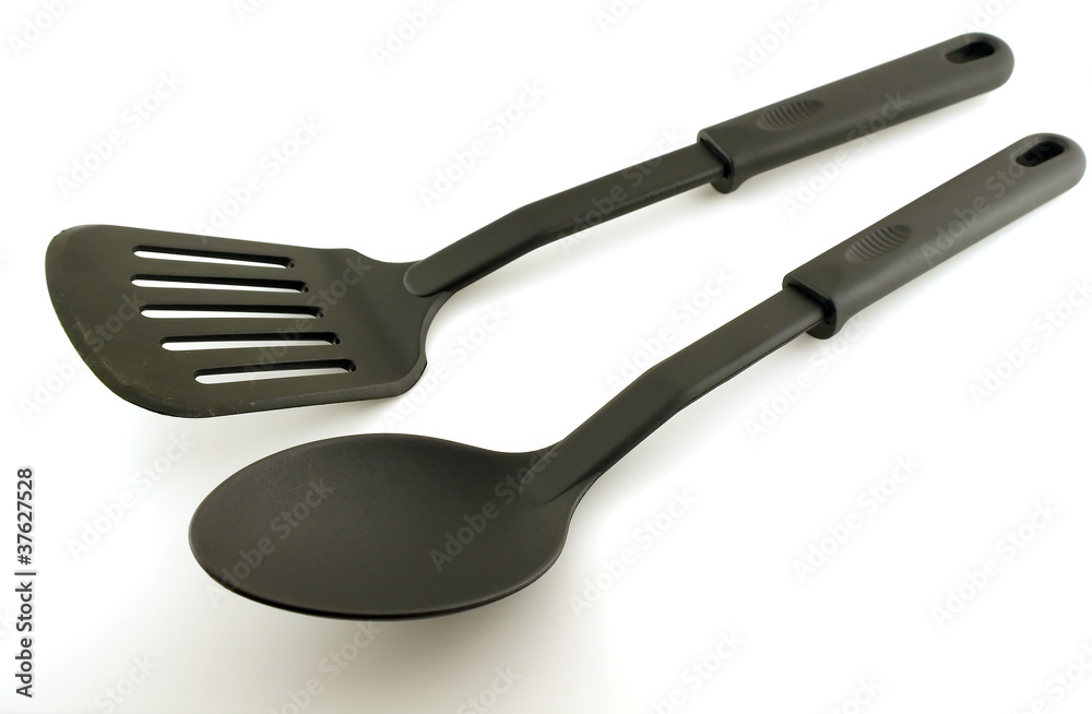 Black plastic kitchenware over white Black plastic kitchenware over white