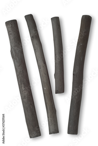 Four Sticks of Charcoal on White