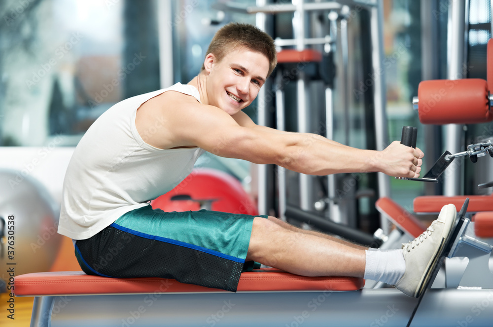 Fototapeta premium positive man at back exercises