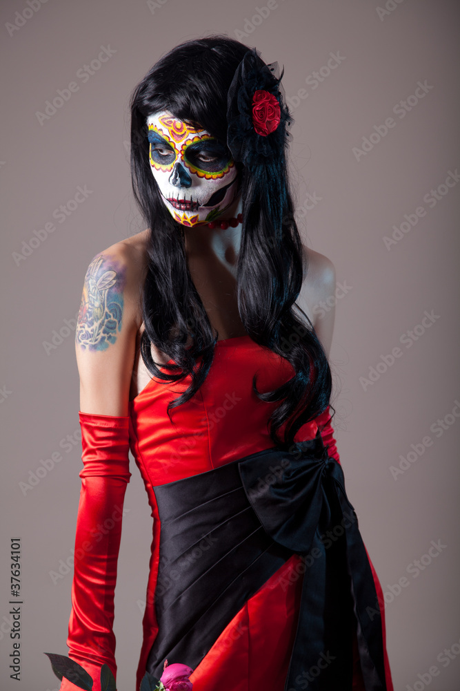 Sugar skull girl in red evening dress Sugar skull girl in red evening dress