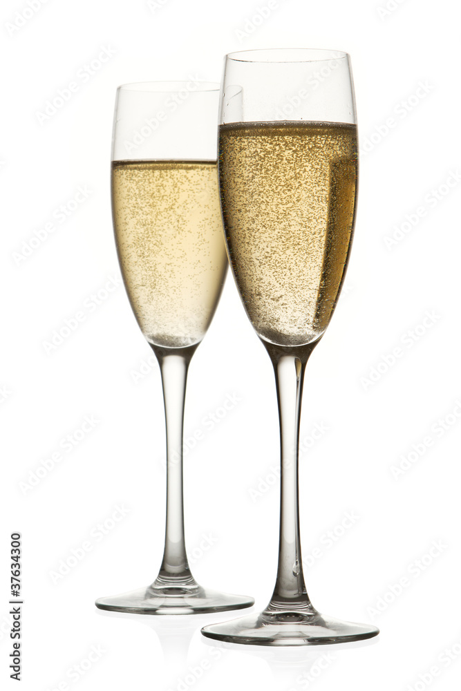 Two glasses of champagne. Isolated on white backgroun Two glasses of champagne. Isolated on white backgroun