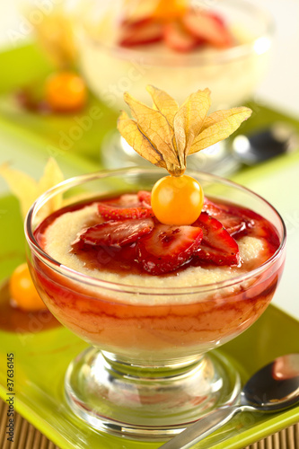 Semolina pudding with strawberry, sauce and physalis