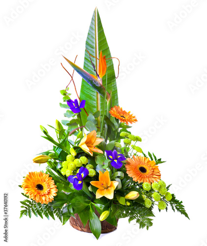 Fototapeta Naklejka Na Ścianę i Meble -  Bright flower bouquet in basket isolated over white background