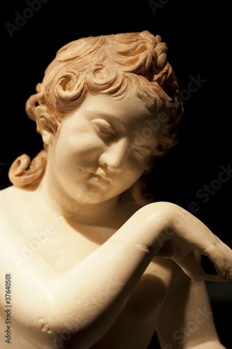 Marble statue of nude roman woman