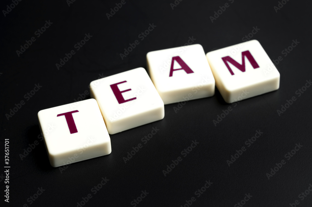 Team word made by letter pieces Team word made by letter pieces