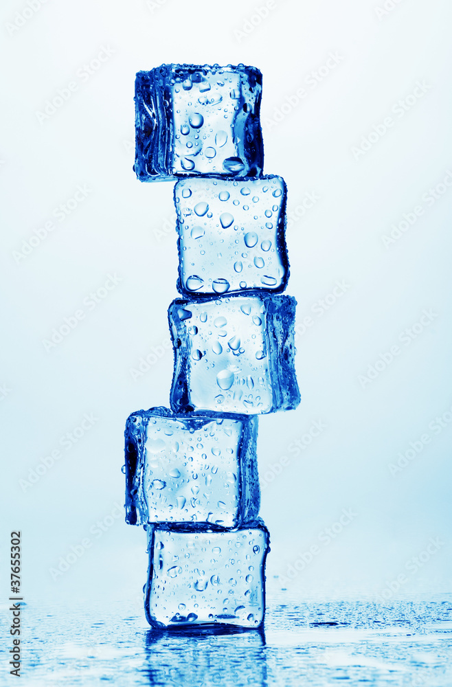 Melting ice cubes isolated on white Melting ice cubes isolated on white