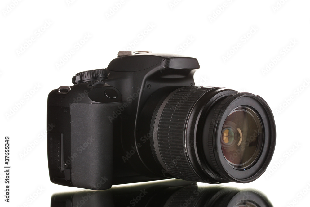 Black photocamera isolated on white