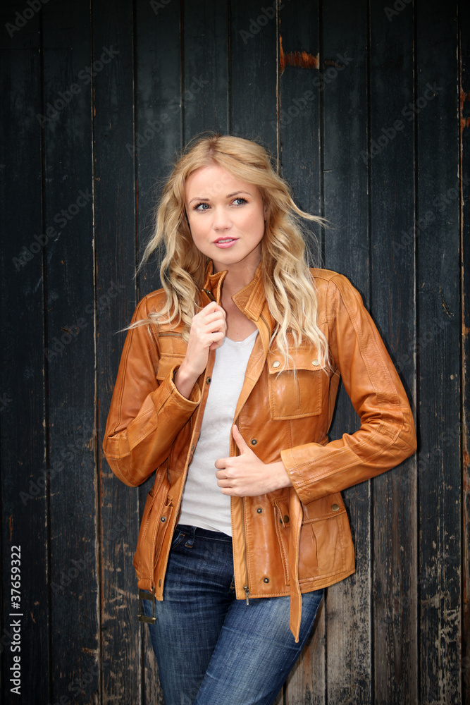 Portrait of beautiful blond woman with leather jacket Portrait of beautiful blond woman with leather jacket