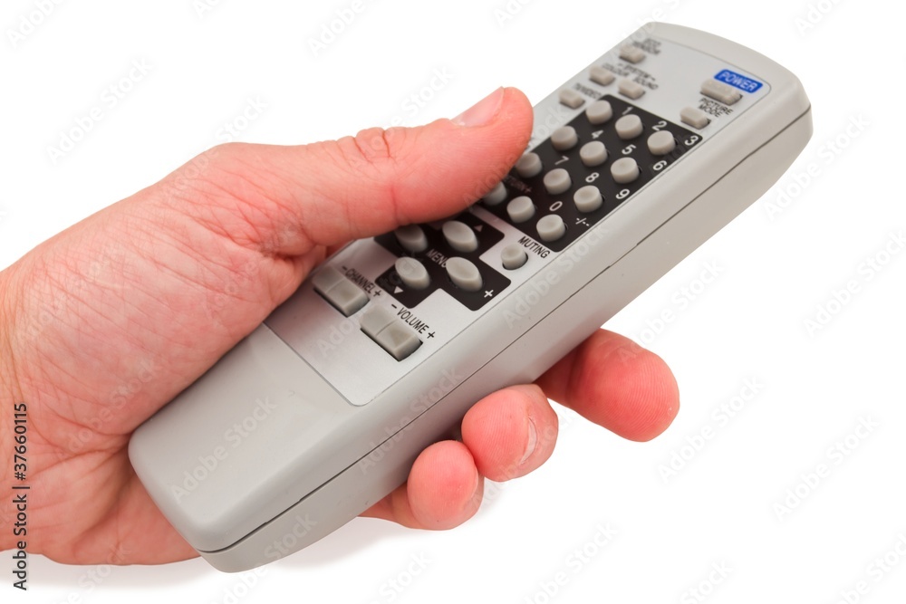 people hand holding remote control unit people hand holding remote control unit