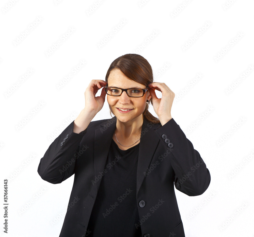 Business woman smiling and looking serious